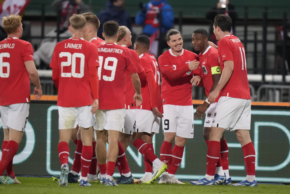 od体育登录-奥地利足球队在双打比赛中大放异彩